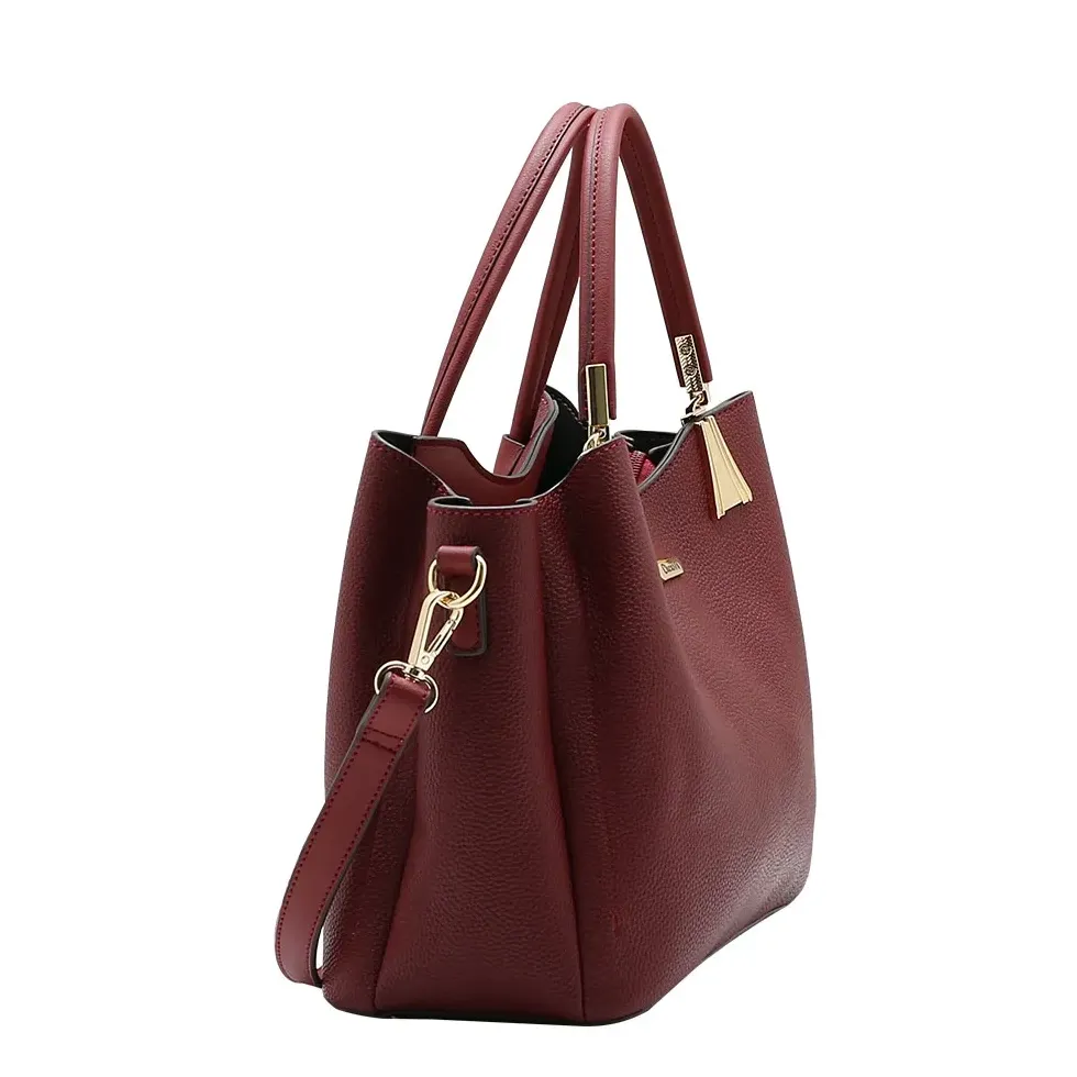 Bolsa Chenson vinho vista lateral mostrando alça removível e detalhes dourados